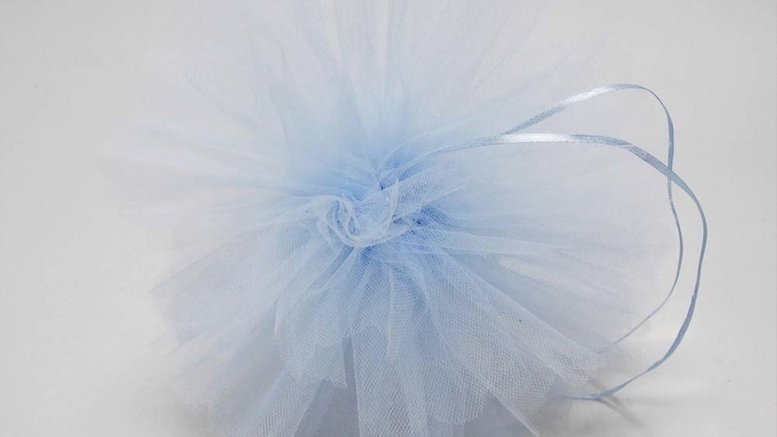 How to Make Tulle Pom Poms: A 6-Step DIY Tulle Poms Tutorial
