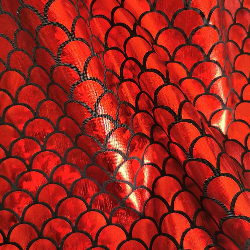 Longan Craft’s Stretch Mermaid Fabric By the Yard features a multicolor reflective laser surface with a black fish scale pattern, draping softly for mermaid-inspired projects. Perfect stretchy material for costumes or crafts.