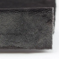 Close-up of Longon Craft's Plush Minky Fabric By The Yard, a 5mm soft polyester minky material in solid dark gray, perfect for plushies, sewing, and crafts.