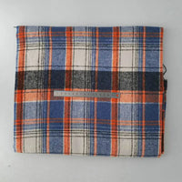 A piece of Longan Craft Multicolor Plaid Mammoth Flannel Fabric by the yard, a soft brushed polyester-cotton textile ideal for shirts, is shown folded with a metal ruler on top for scale against a plain light background.