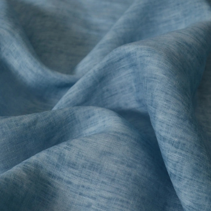 Longan Craft’s 100% Linen Fabric by the Yard in solid light blue features a lightweight, breathable weave and soft drape—ideal for comfortable summer projects.