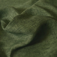 Close-up of Longan Craft's 100% linen fabric by the yard in olive green, featuring a visible weave pattern, gentle folds, and soft shadows—perfect as a solid color lightweight and breathable summer material.