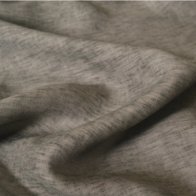 Close-up of Longan Craft's 100 Linen Fabric By The Yard, a solid color lightweight, 100% linen material with subtle texture and soft folds—ideal for comfortable summer projects and showcasing the natural drape of sustainable linen.