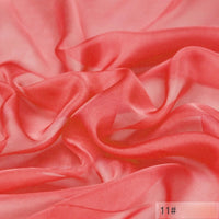 Sheer, lightweight coral pink 100 Mulberry Silk Chiffon Fabric by Longan Craft, featuring soft folds and a flowing texture; number 11# is printed in the bottom right corner. Ideal for dresses and available by the yard.