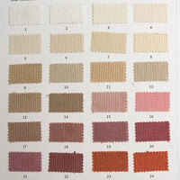 The Longan Craft 11 Wales Cotton Corduroy swatch card features 24 numbered samples of solid, thick premium corduroy fabric in off-white, beige, pink, mauve, red, and orange shades—ideal for apparel and available by the yard.