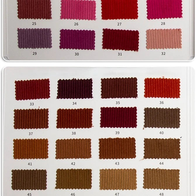 A color chart displays two rows of Longan Craft’s 11 Wales Cotton Corduroy Fabric swatches—red, purple, pink, and brown shades—numbered 26–48. Each solid, thick corduroy textured sample is ideal for apparel comparison.