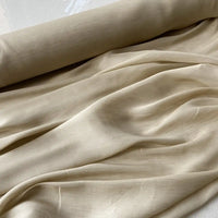 A close-up of Longan Craft’s 14 Momme Linen Silk Fabric—vibrant organza Mulberry silk with smooth folds and a slightly sheer texture, perfect for elegant summer curtains.