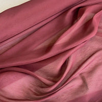 A close-up view of Longan Craft's 14 Momme Linen Silk Fabric by the yard in dusty rose pink, showcasing its soft, flowing texture and gentle folds—perfect as a vibrant organza Mulberry silk material for summer.