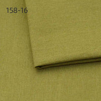 A close-up of Longan Craft's light olive green Faux Linen Upholstery Fabric By The Yard, neatly folded to show its weave texture. "158-16" appears in the top left corner. Ideal polyester fabric for furniture, chairs, sofas, and curtains.