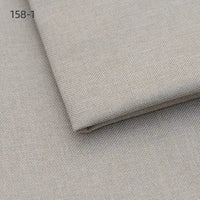 Longan Craft’s Faux Linen Upholstery Fabric By The Yard, in beige polyester, is folded neatly to display its fine, even texture. The number 158-1 appears in the image's top left corner. Ideal for chair, sofa, or curtain reupholstery.