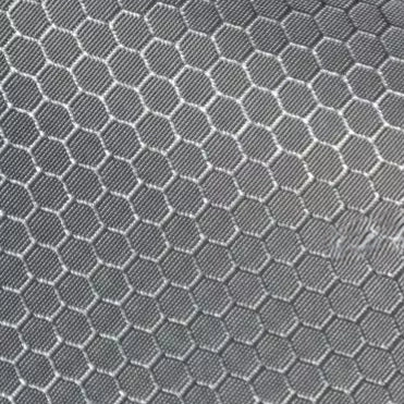 Close-up of Longan Craft's 210D Honeycomb Pattern Oxford Fabric By The Yard, featuring a white hexagonal honeycomb design and detailed stitching on waterproof, colorful PU coated oxford material ideal for outdoor use.