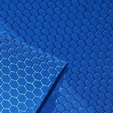 Close-up of Longan Craft's 210D Honeycomb Pattern Oxford Fabric by the yard, a colorful PU coated, waterproof oxford material with a shiny hexagonal design—ideal for outdoor use and gear.