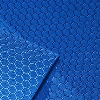 Close-up of Longan Craft's 210D Honeycomb Pattern Oxford Fabric by the yard, a colorful PU coated, waterproof oxford material with a shiny hexagonal design—ideal for outdoor use and gear.