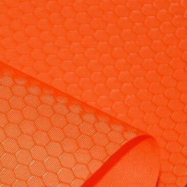 Close-up of Longan Craft’s 210D Honeycomb Pattern Oxford Fabric by the Yard, a colorful PU coated, waterproof polyester ideal for outdoor use, featuring a hexagonal honeycomb design with one edge rolled to showcase texture.