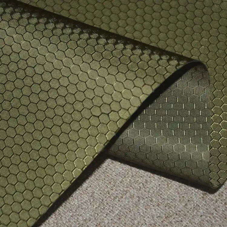 A close-up of Longan Craft's 210D Honeycomb Pattern Oxford Fabric By The Yard, featuring a colorful PU coating, hexagonal design, and waterproof finish—perfect for outdoor use and gear.