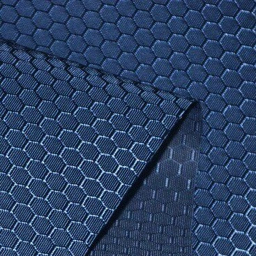 Longan Craft’s 210D Honeycomb Pattern Oxford Fabric By The Yard, featuring a colorful PU coating, showcases its waterproof, geometric texture—ideal for outdoor use—with two overlapping dark blue pieces highlighting the material’s versatility.