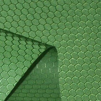 A close-up of Longan Craft’s 210D Honeycomb Pattern Oxford Fabric By The Yard highlights the waterproof, colorful PU coated material’s hexagonal texture—perfect for outdoor use and gear projects.