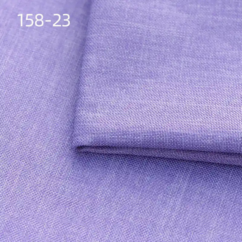 A close-up of folded light purple Faux Linen Upholstery Fabric by Longan Craft, made of polyester with a subtle texture. The number 158-23 appears in the upper left corner.