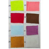 A Longan Craft swatch card shows eight silky polyester satin fabric samples (25–32) in neon yellow, coral, red, brown, light blue, purple, orange, and white. Each has zigzag edges. Perfect for apparel by the yard.
