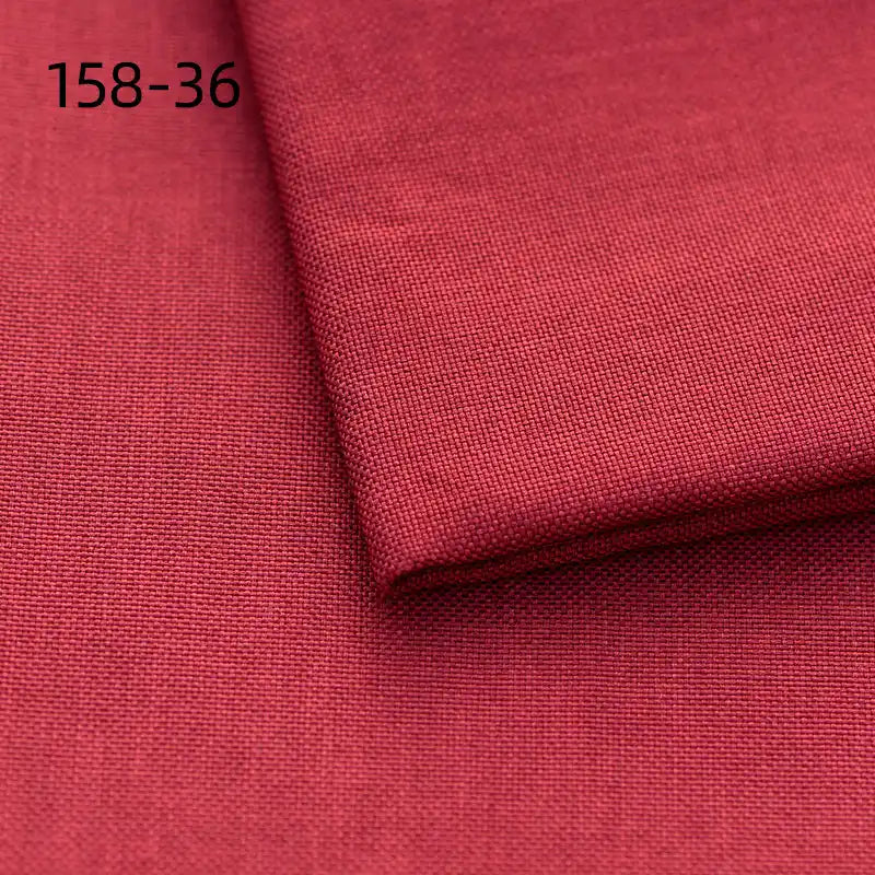 Close-up of deep red Faux Linen Upholstery Fabric by the yard from Longan Craft, made of polyester for reupholstering chairs, sofas, or curtains. Fine woven texture visible; "158-36" is printed in black at the top left corner.