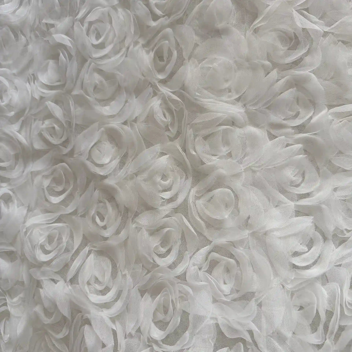 Close-up of the 3D Blossom Roses Embroidered Tulle Fabric by Longan Craft, featuring multicolor floral embroidery with intricate rosette patterns—perfect for evening and prom dresses.