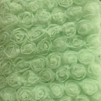 Close-up of Longan Craft's 3D Blossom Roses Embroidered Tulle Fabric by the yard, featuring multicolor floral embroidery arranged in textured, layered rose clusters—perfect for evening or prom attire.