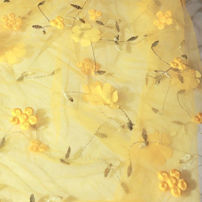 Close-up of Longan Craft 3D Floral Embroidered Tulle Fabric by the yard, featuring colorful botanical embroidery—airy and elegant, this bridal tulle material is ideal for wedding dresses.