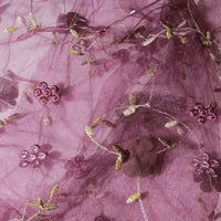 The Longan Craft 3D Floral Embroidered Tulle Fabric features colorful botanical embroidery on sheer tulle—ideal as bridal tulle material by the yard for elegant gowns and special occasions.