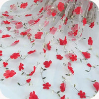 Longan Craft’s 3D Floral Embroidered Tulle Fabric By The Yard features colorful botanical embroidery—ideal bridal tulle material for elegant wedding dresses or gowns.