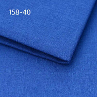 Two pieces of Longan Craft Faux Linen Upholstery Fabric in bright blue, neatly folded, feature the numbers 158-40 printed in white at the upper left; ideal polyester fabric for reupholstering chairs, sofas, or curtains.