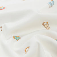 Longan Craft’s Animal and Botanical Printed Heavy Weight Cotton Jersey Fabric features whimsical rainbows, a bunny with a halo, and pastel motifs on soft, gently textured sweatshirt jersey—sold by the yard.