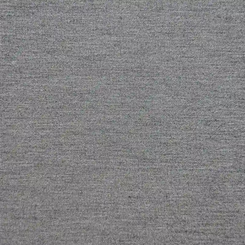 Close-up of Longan Craft's Bamboo Jersey Fabric by the Yard, a plain light grey single elastane jersey. Its soft, smooth texture makes this eco-friendly material ideal for loungewear and other comfortable apparel.