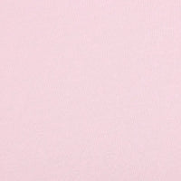 A close-up of Longan Craft’s Bamboo Jersey Fabric By The Yard showcases its light pink, smooth, and finely textured surface—an eco-friendly, plain elastane jersey perfect for loungewear with no visible patterns or designs.