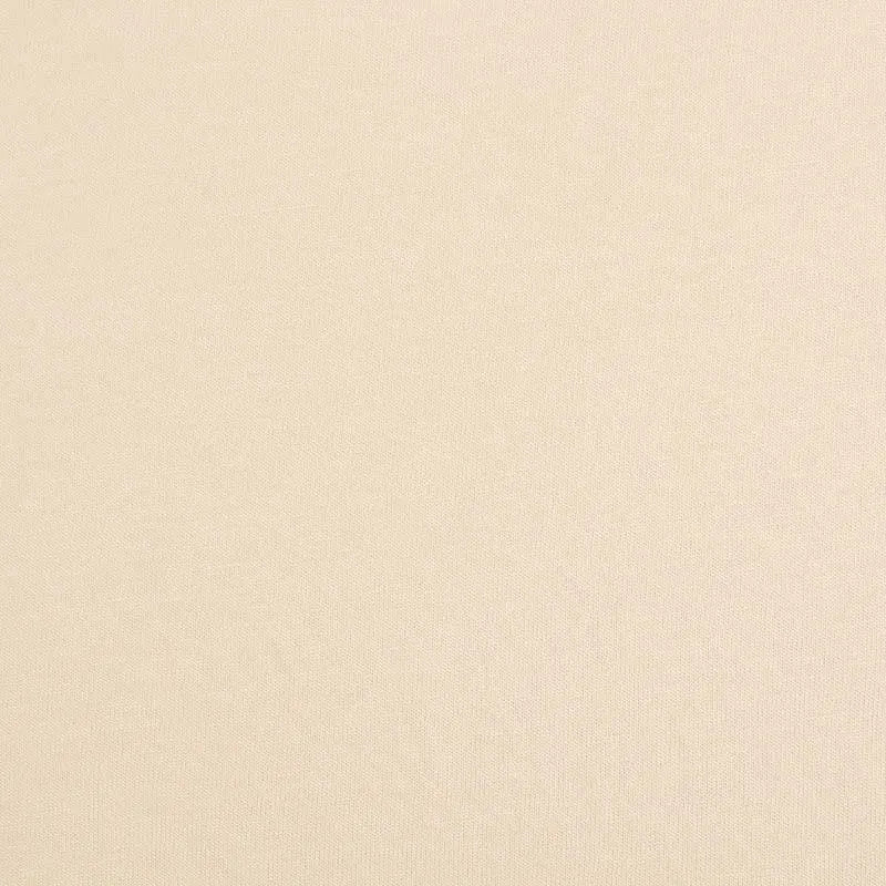 A close-up of Longan Craft's Bamboo Jersey Fabric By The Yard, a soft, plain-color single elastane eco-friendly jersey textile with an even texture—ideal for comfortable loungewear.