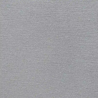 Close-up of Longan Craft's Bamboo Jersey Fabric By The Yard—a plain color, single elastane jersey with fine ribbed texture. Soft and eco-friendly, this textile is perfect for loungewear and anyone seeking sustainable fabric options.