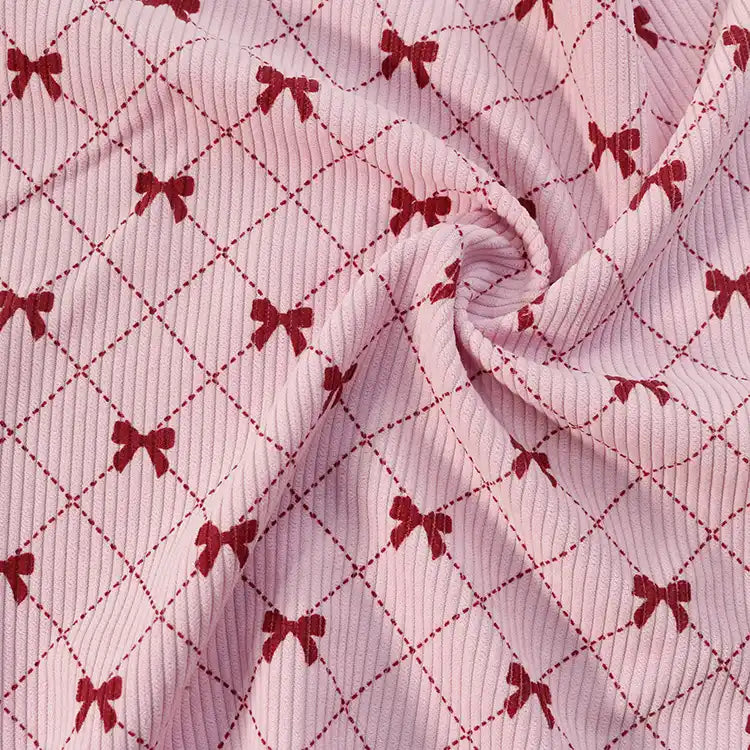 Longan craft’s Bow Plaid Print Corduroy Fabric By The Yard is a heavyweight, soft, and durable corduroy material featuring a red bow and diamond grid check print. The fabric’s gathered center creates gentle folds and rich texture, making it ideal for clothing projects.
