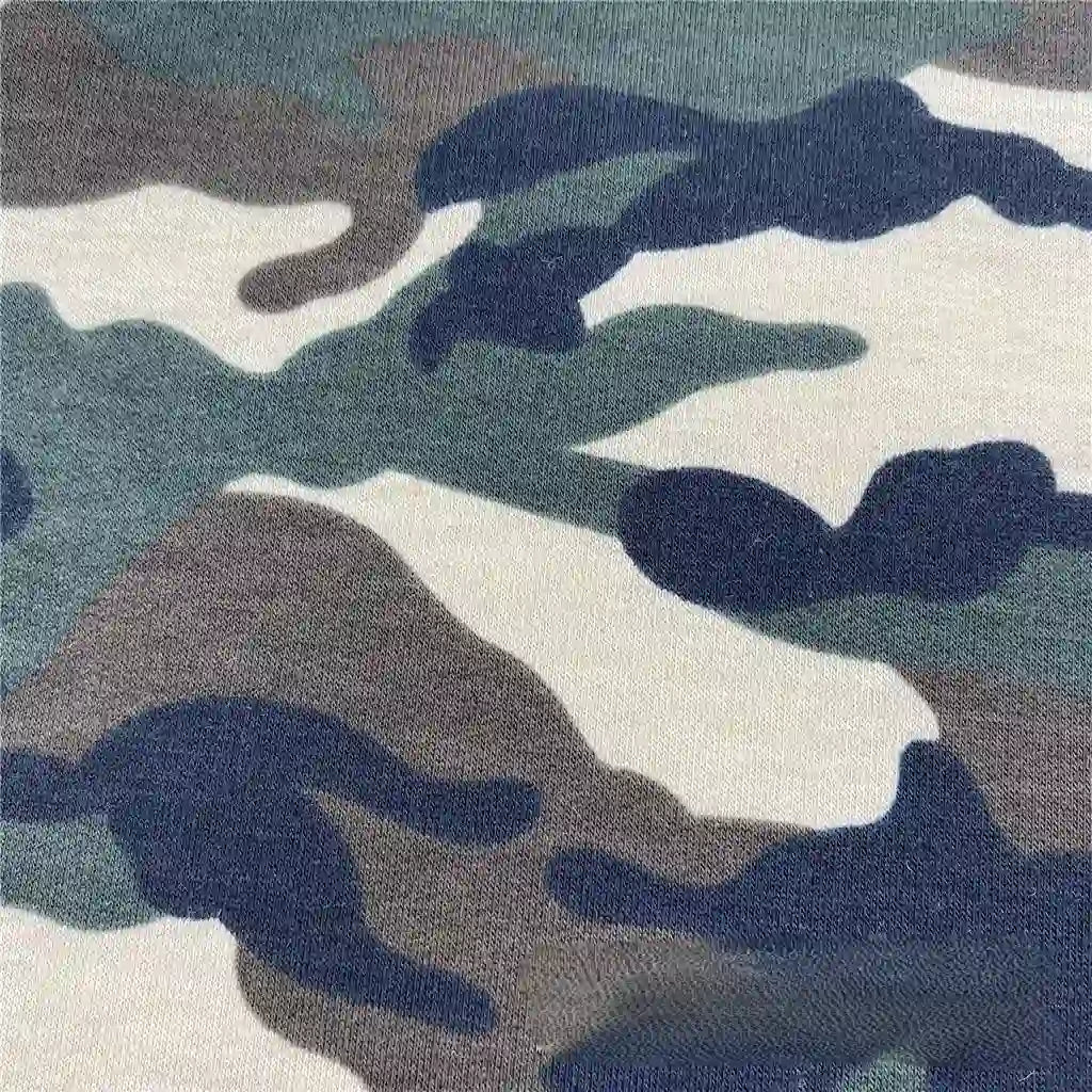 Close-up of Longan Craft Camo Printed Stretch French Terry Fabric by the yard—breathable camouflage print material in green, brown, beige, and black, perfect for sports apparel and sweatshirts.