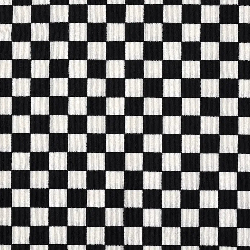 Longan Craft’s Checkered Corduroy Fabric By The Yard features classic black and white evenly sized squares, printed on soft polyester corduroy—perfect for apparel with a vintage-inspired grid design.