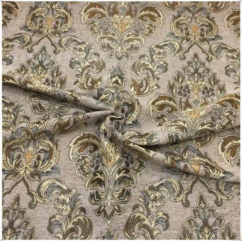Longan Craft's Chenille Damask Fabric by the Yard features an elegant, symmetrical floral jacquard pattern in beige and gold, perfect for upholstery or home décor projects that showcase its ornate folds and texture.