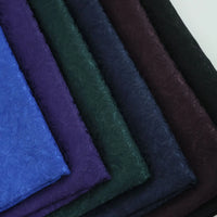 Colorful Brocade Damask Fabric by the yard from Longan Craft features patterned jacquard textile in blue, green, purple, and black—ideal for upholstery or as perfect damask dress material.