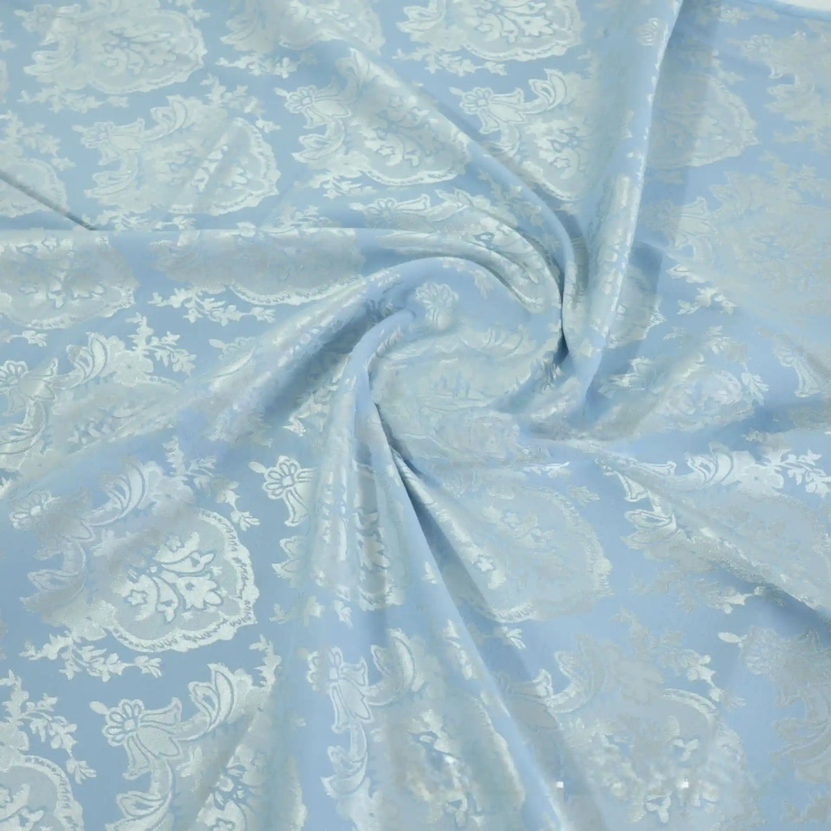 Longan Craft’s Colorful Cotton Damask Fabric by the Yard features a smooth, reflective antique floral weave in soft blue hues, arranged in elegant folds for a vibrant and stylish upholstery touch.
