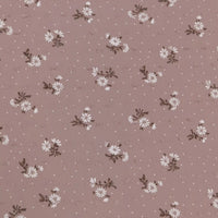 Longan Craft's Colorful Daisy Print Swiss Dot Fabric by the yard features 100% cotton with printed flowers and dotted Swiss texture—ideal for casual wear and anyone who loves floral, breathable fabrics.