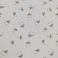 Longan Craft Colorful Daisy Print Swiss Dot Fabric by the yard is 100% cotton, featuring a dotted texture and vibrant daisy flower print—perfect for breathable, casual wear.