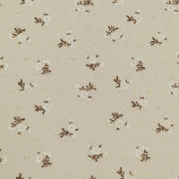 Longan Craft's Colorful Daisy Print Swiss Dot Fabric by the yard is 100% cotton with a soft dotted texture and features vibrant flower prints, making it a breathable choice for casual wear.