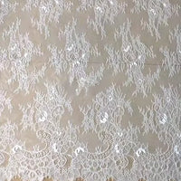 Longan Craft's Colorful Floral Embroidered Lace Fabric by the yard features vintage scalloped edges and a delicate botanical pattern—ideal for wedding gowns, elegant dresses, or creative projects.