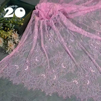 A sheet of Colorful Floral Embroidered Lace Fabric by Longan Craft, featuring vintage scalloped lace with a botanical pattern in delicate pink, is displayed flat with flowers and the number 20 in white at the upper left corner. Ideal for wedding gowns.