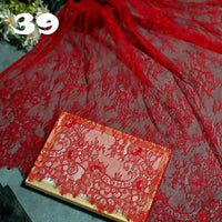 Longan Craft’s Colorful Floral Embroidered Lace Fabric by the yard, featuring a vintage scalloped botanical pattern, is draped and folded on a wooden board with the number 39 in white text at the top left.