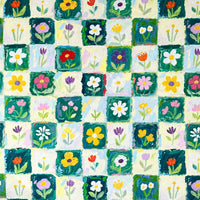 Colorful Floral Print Canvas Fabric By The Yard in a checkered pattern of dark green and cream squares, each featuring a small, hand-painted style floral print in various colors.