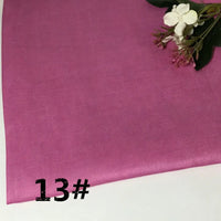 A vibrant pink fabric from Longan Craft’s Colorful Lightweight Ramie Fabric By The Yard collection, made of pure soft ramie, featuring a small cluster of white and purple flowers in the top right corner and bold black “13#” printed in the bottom left corner.