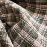 Close-up of the Longan Craft Colorful One Side Sueded Flannel Fabric By The Yard, a yarn-dyed cotton plaid flannel featuring a soft, super snuggle fall material with green and pink checks, highlighting the fabric’s brushed texture and gentle folds.